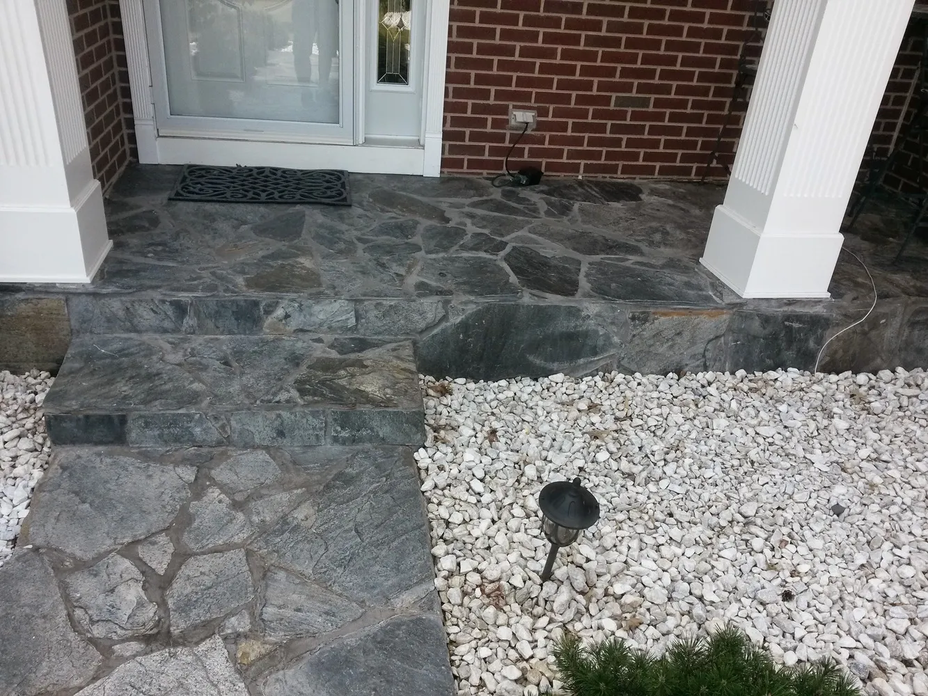 porch after outdoor tile installation project
