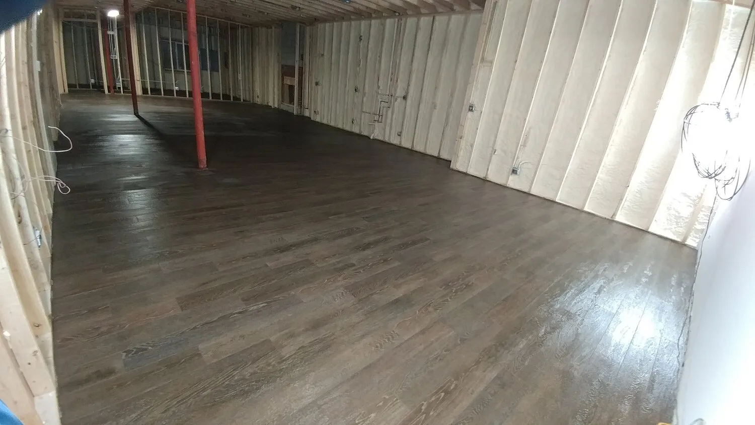wood-like ceramic tile installation in progress