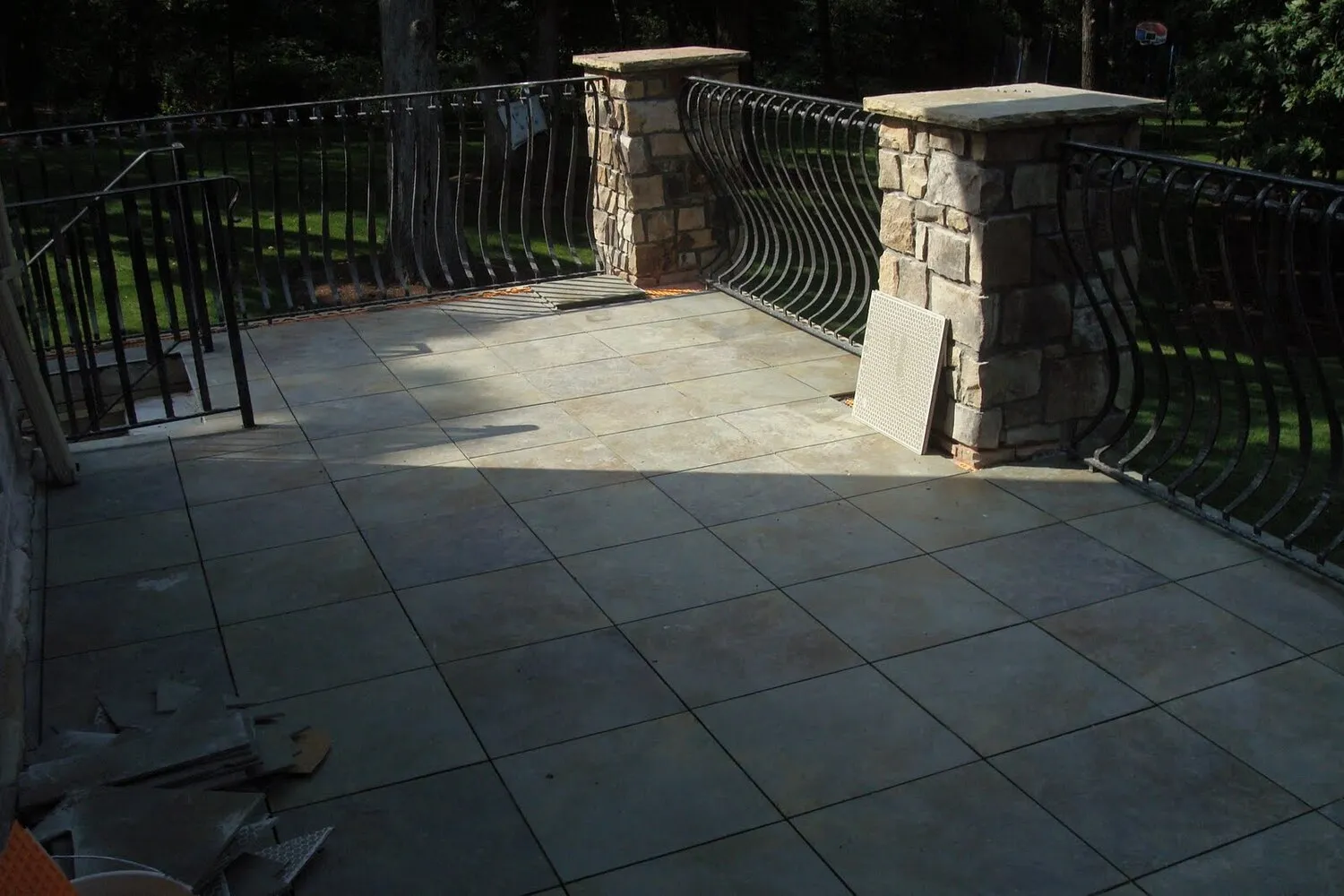 natural stone tile installation on patio