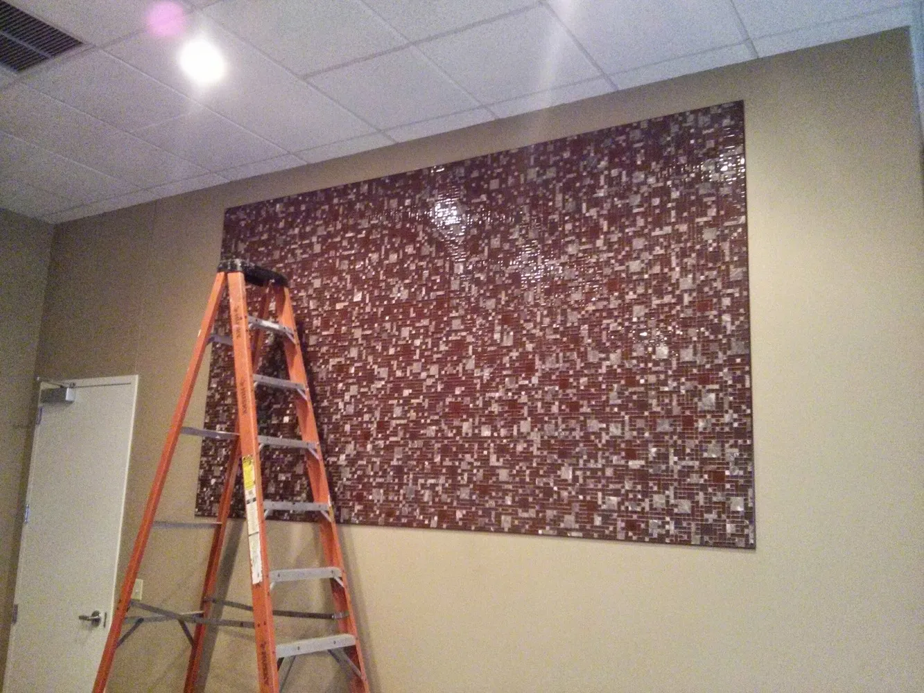 detailed custom tile installation on wall