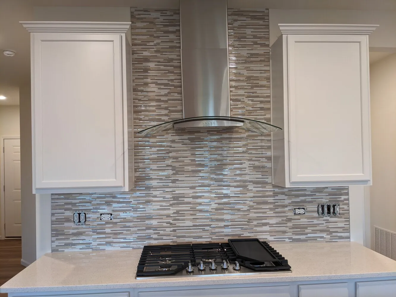 backsplash upgrade using mosaic tile installation