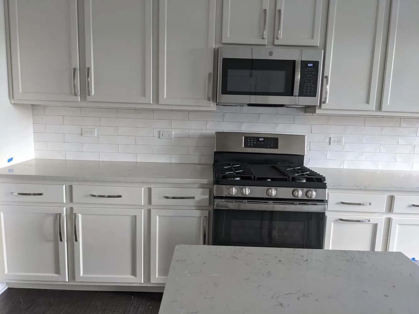 kitchen renovation with mosaic tile installation